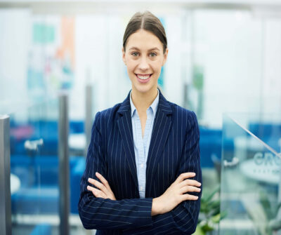 successful-businesswoman-posing-ZDGNKJB-scaled